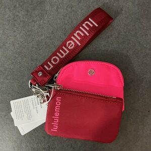 lululemon athletica Two-Tone dual pouch wristlet in Pink and Maroon